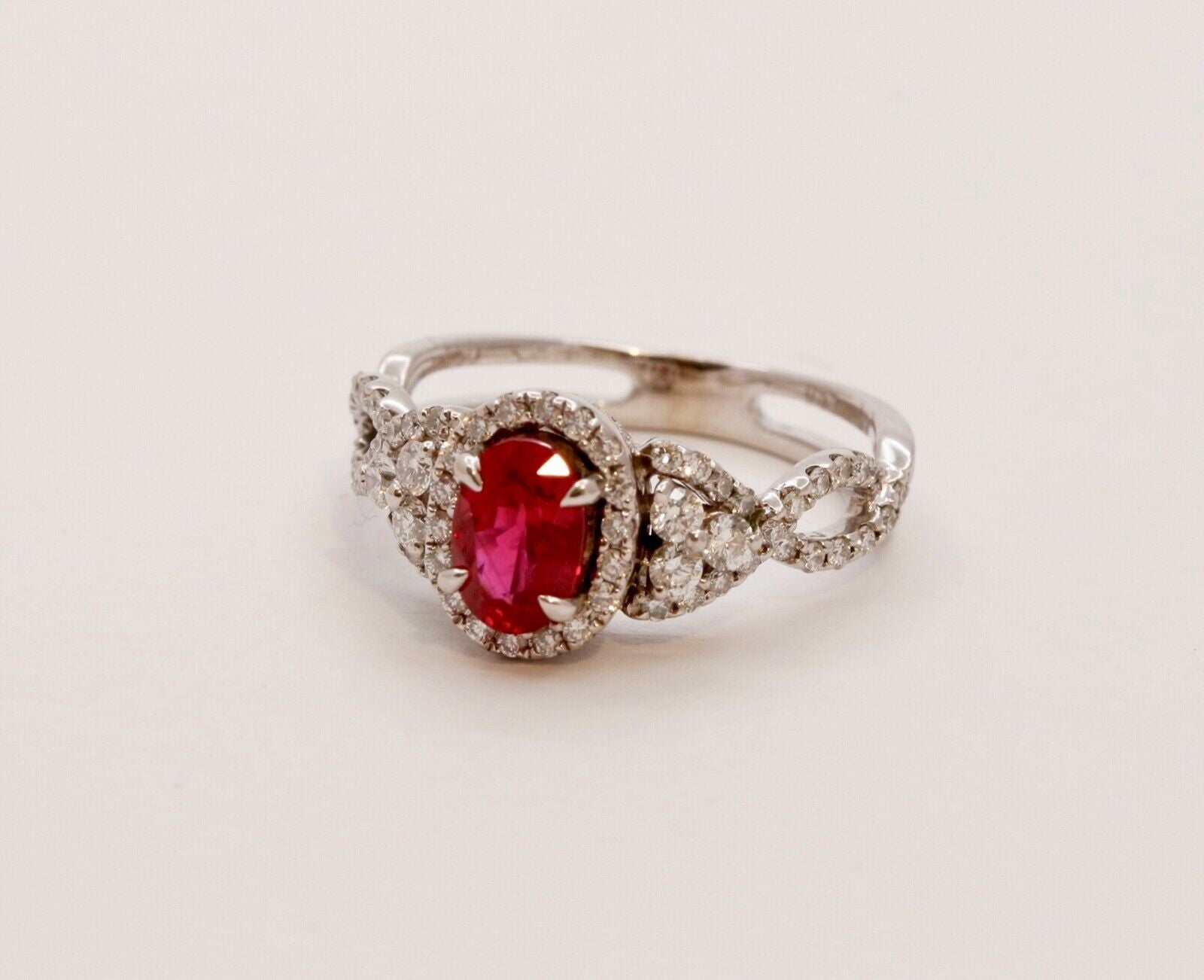 Elegant Crossover Ruby Diamonds Engagement Ring