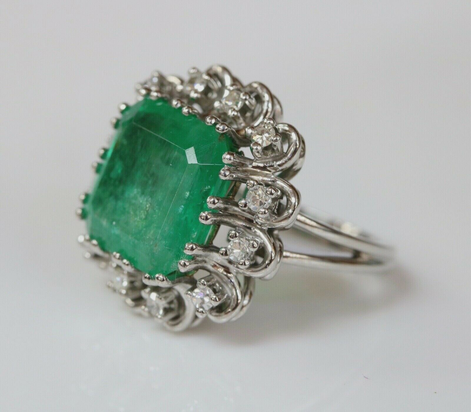 Vintage Emerald Cut Columbian Emerald Diamonds Platinum Ring