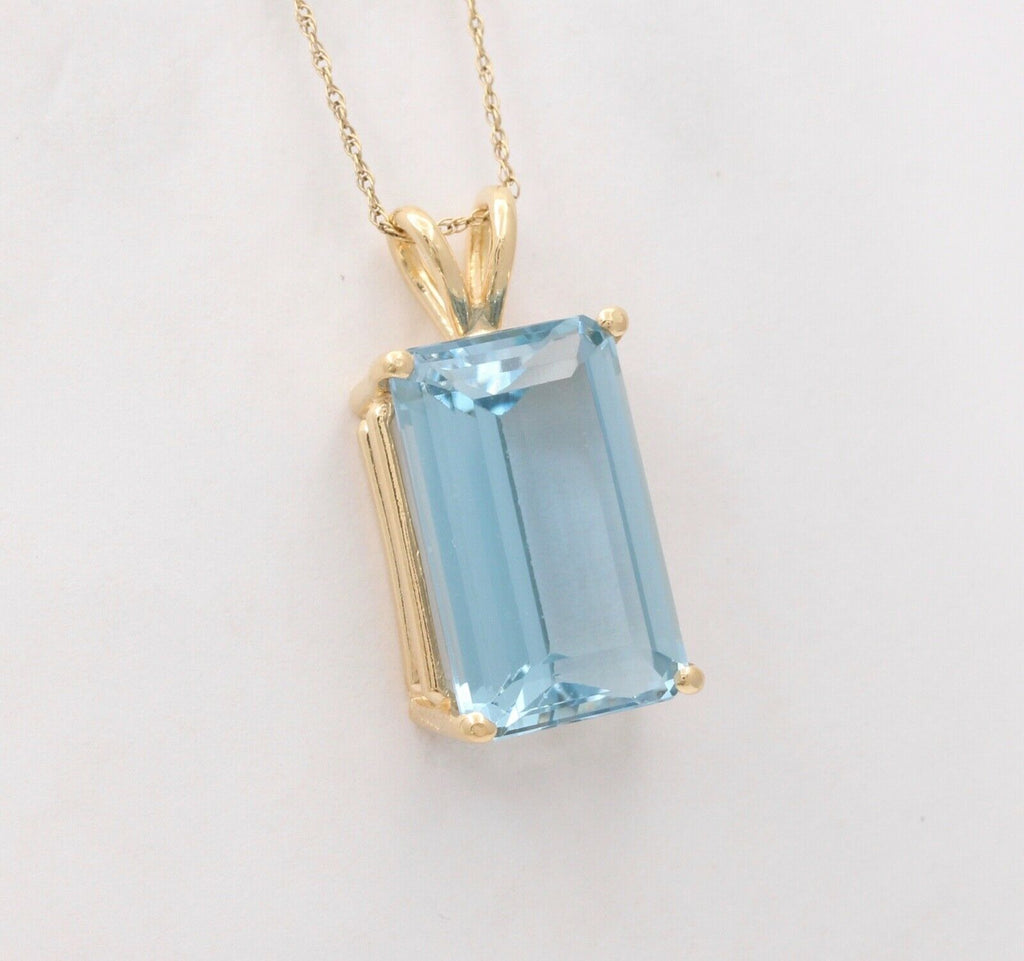 Vintage 14K Yellow Gold Solitaire Blue Topaz Pendant, Necklace. 2366