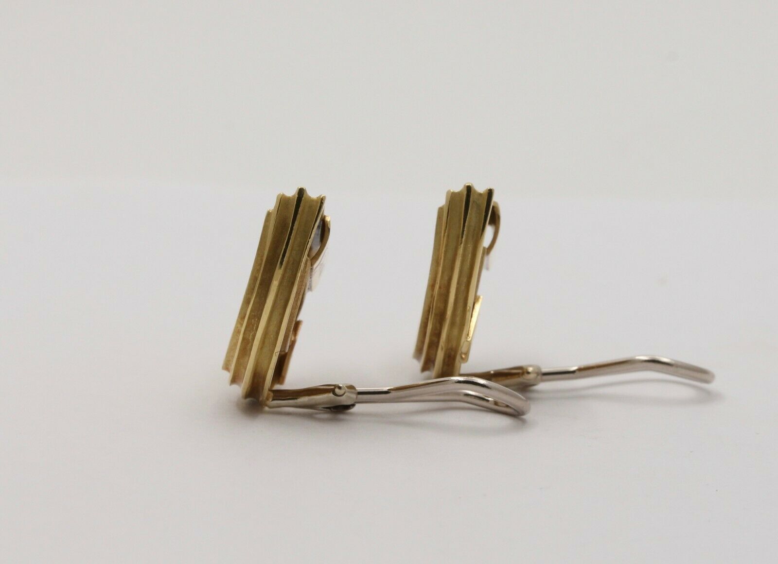 The Christopher Walling Classic Half Moon 14K Yellow Gold Clip Earrings.