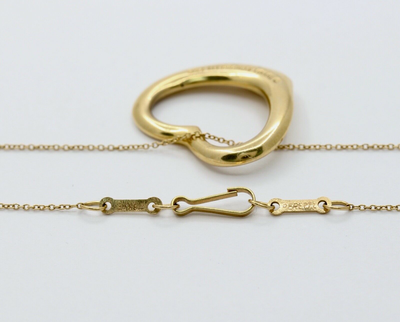 Tiffany and Co Elsa Peretti Floating Heart Pendant and Chain 18K Yellow Gold