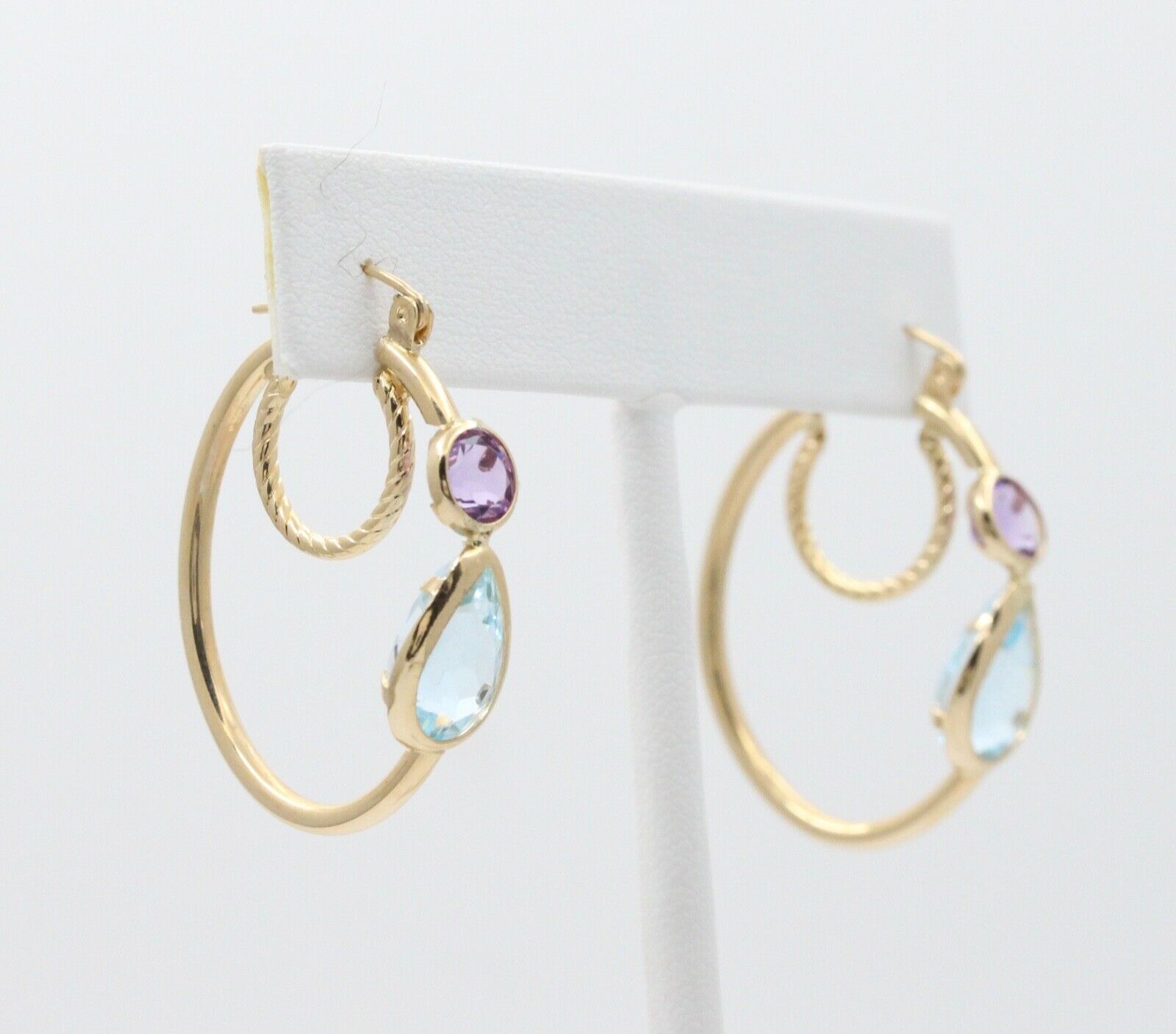 Minimalist 14K Yellow Gold Blue Topaz & Amethyst Huggie Earrings.