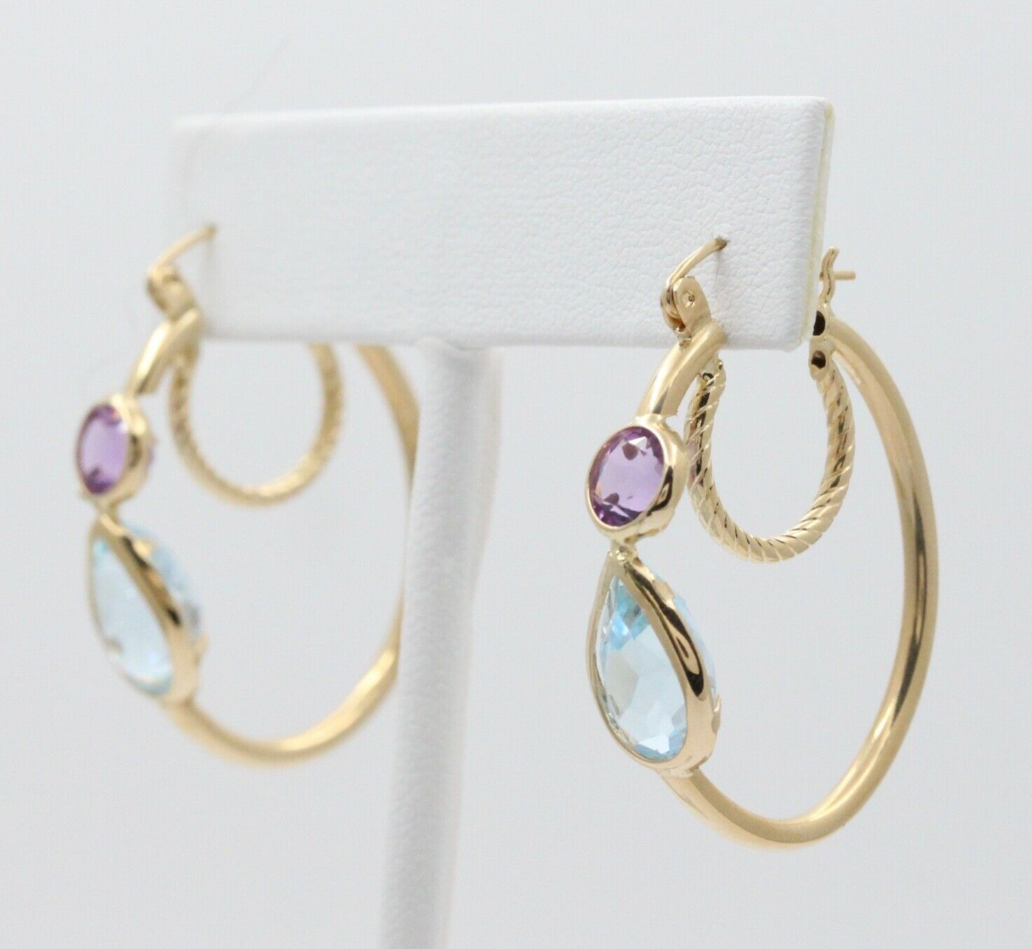 Minimalist 14K Yellow Gold Blue Topaz & Amethyst Huggie Earrings.