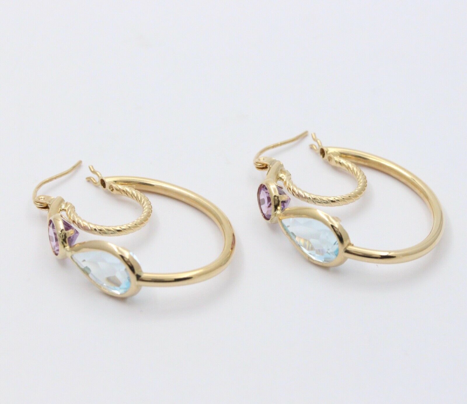 Minimalist 14K Yellow Gold Blue Topaz & Amethyst Huggie Earrings.
