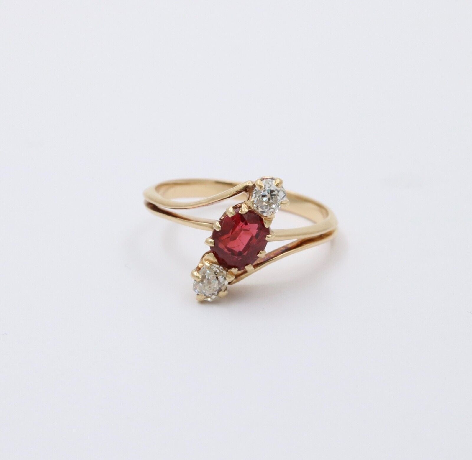 Antique 18K Yellow Gold Ruby And Diamond Bypass Three Stone Ring