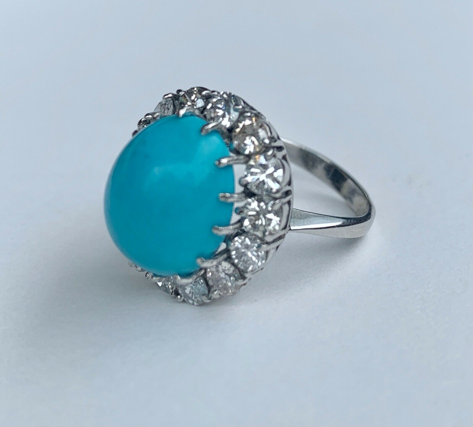 Gorgeous Vintage Persian turquoise Platinum Ring With Diamonds Halo.
