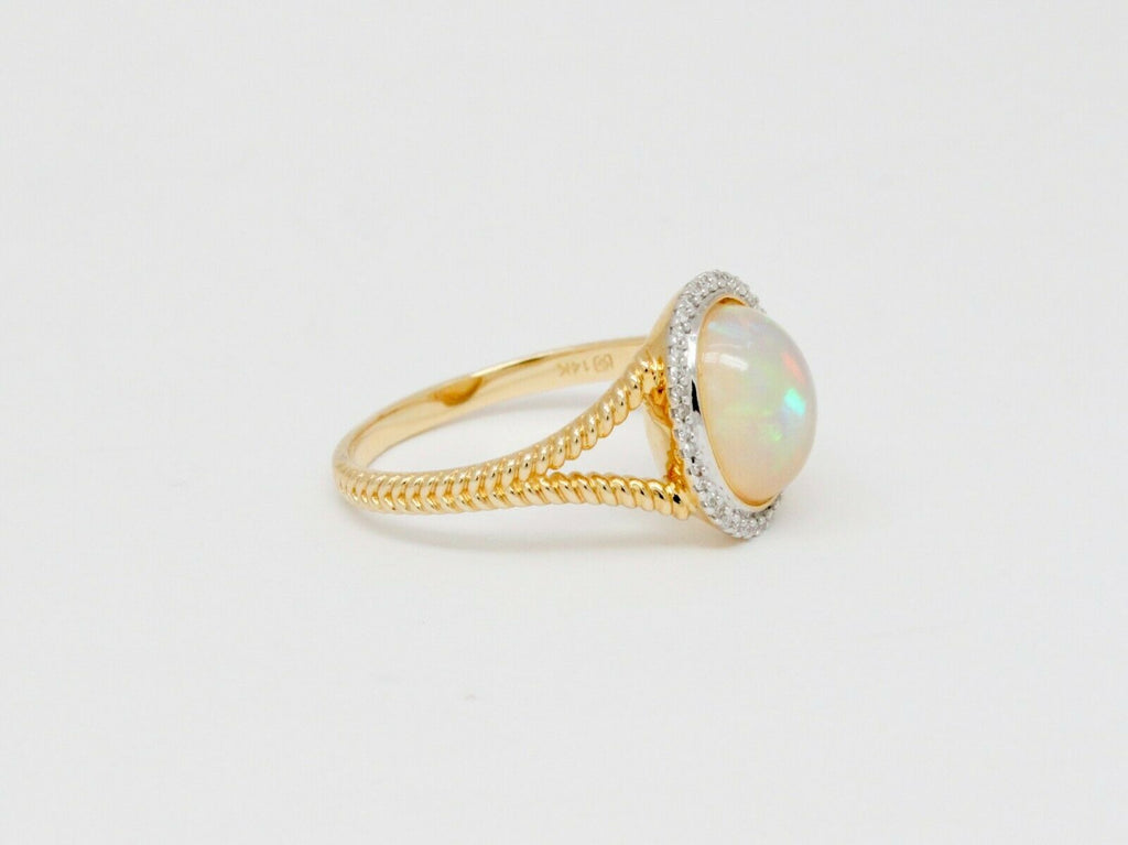 Vintage 14K Yellow Gold Opal and Diamond Halo Ring
