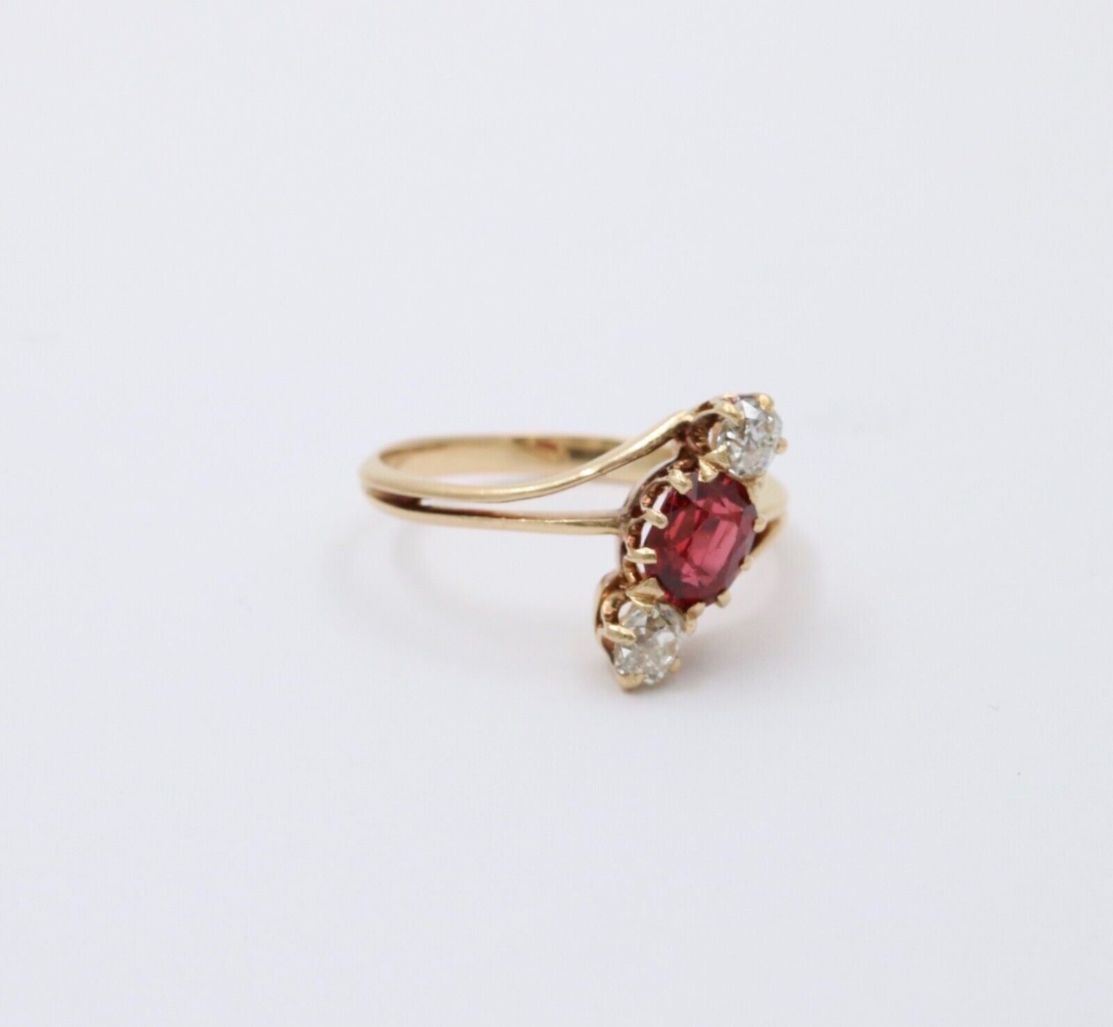 Antique 18K Yellow Gold Ruby And Diamond Bypass Three Stone Ring