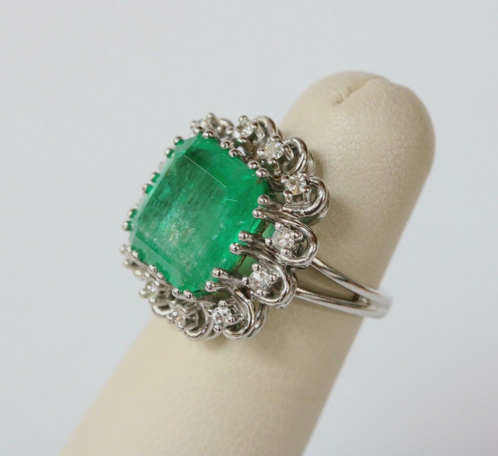 Vintage Emerald Cut Columbian Emerald Diamonds Platinum Ring